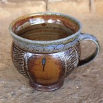 Handmade stoneware cup by Puketai Pottery